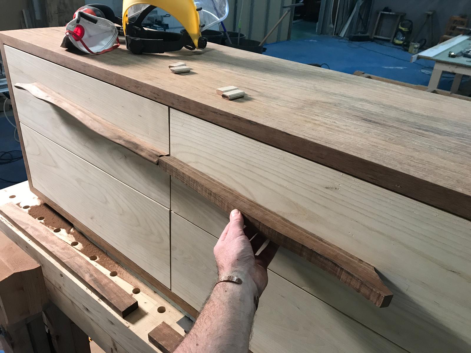 Fitting a handle by hand in the workshop